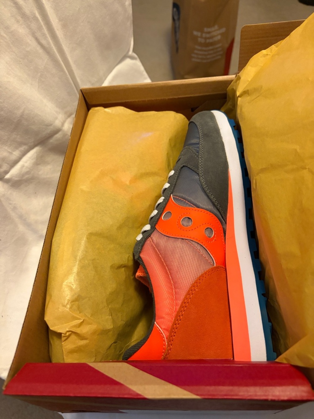 Saucony sneakers.